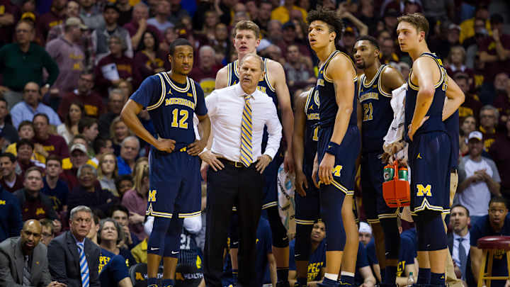 Michigan's plane slides off runway, players safe after accident