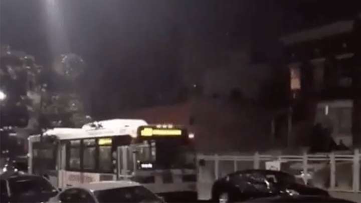 Heavens! Get a load of this empty New York City bus flying backwards down a street Heavens! Get a load of this empty New York City bus flying backwards down a street