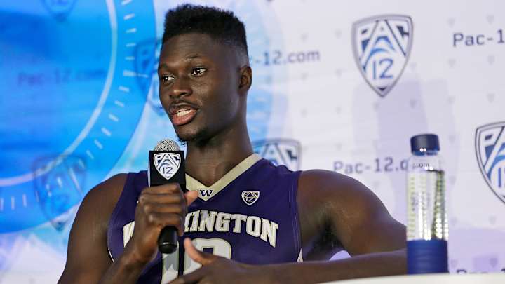 Washington forward Malik Dime slaps Colorado student heckler