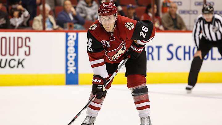 Flames acquire defenseman Michael Stone from Coyotes for draft picks