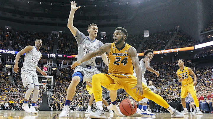 Kansas and Missouri's Hoops Exhibition Raises Over $1.75M for Hurricane Relief Kansas and Missouri's Hoops Exhibition Raises Over $1.75M for Hurricane Relief