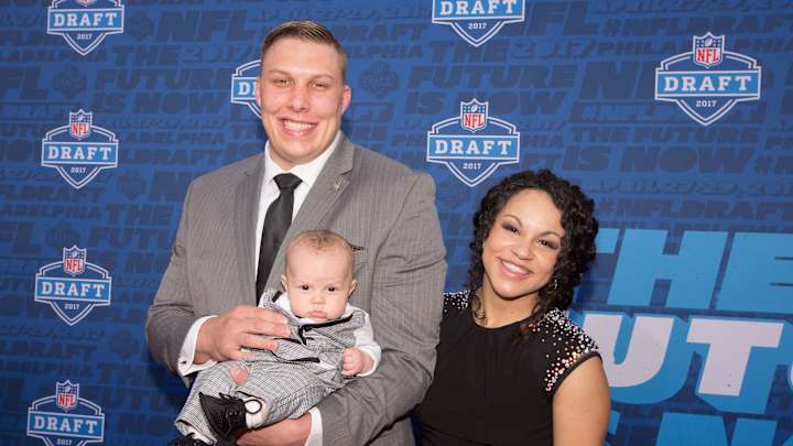 Newest Bronco Garett Bolles brought his baby to the draft stage in a suit Newest Bronco Garett Bolles brought his baby to the draft stage in a suit