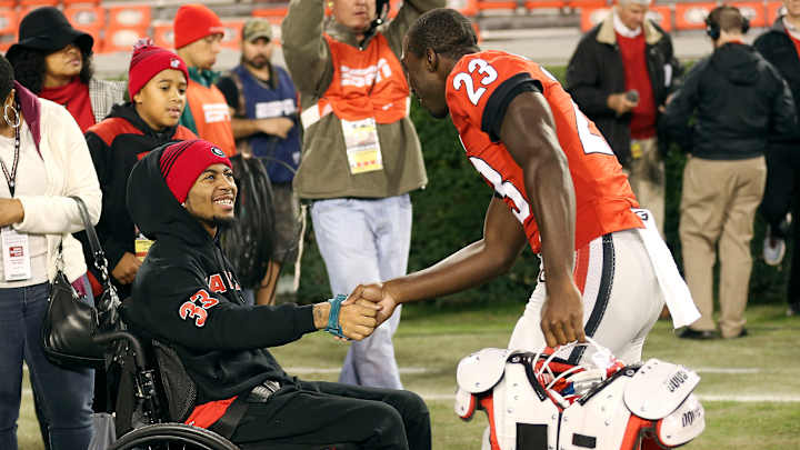 Devon Gales, paralyzed by hit against Georgia, is walking again