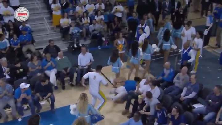 Scary cheerleading injury only gets worse when rescuer slips and falls