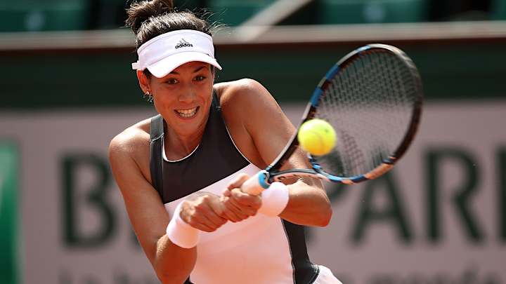 Garbine Muguruza starts French Open title defense with a win