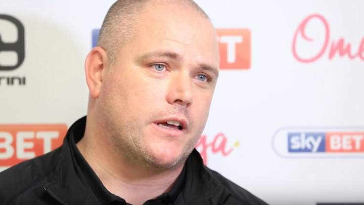 Watch: English soccer manager gets choked up after fans chip in to pay his fine