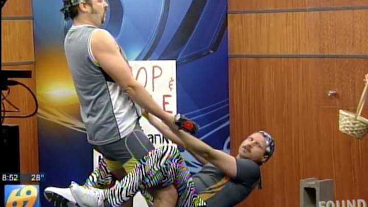 Fake strongmen convince local morning shows to let them do idiotic workouts on TV