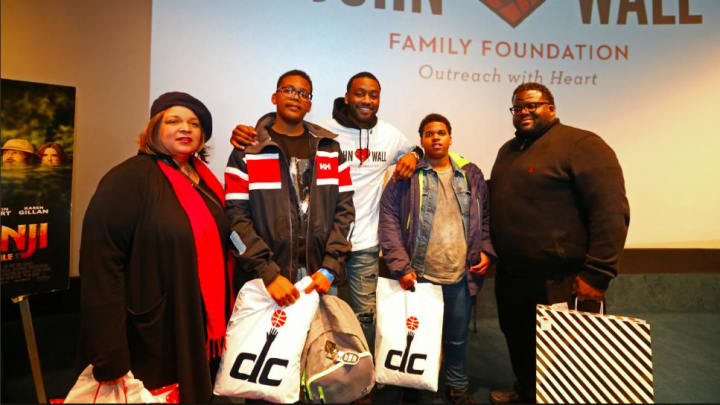 John Wall Surprises Struggling Family By Paying for Kids' Private School Tuition, Buying Them Groceries John Wall Surprises Struggling Family By Paying for Kids' Private School Tuition, Buying Them Groceries