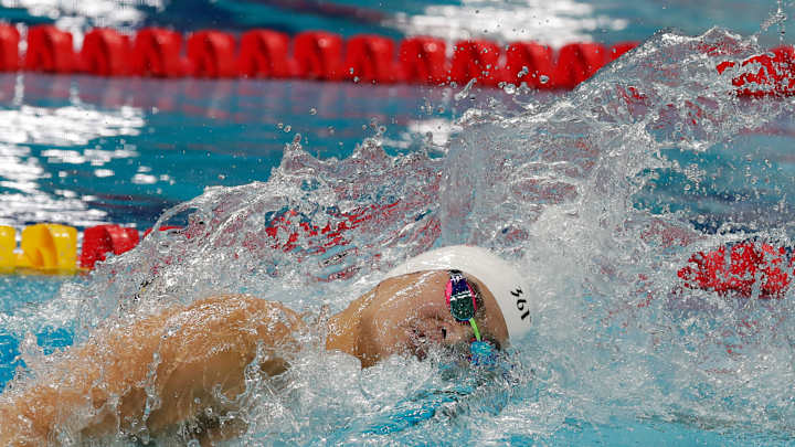 Ledecky off to a blazing start on very busy week at worlds