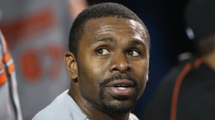 Orioles' Michael Bourn breaks finger catching football