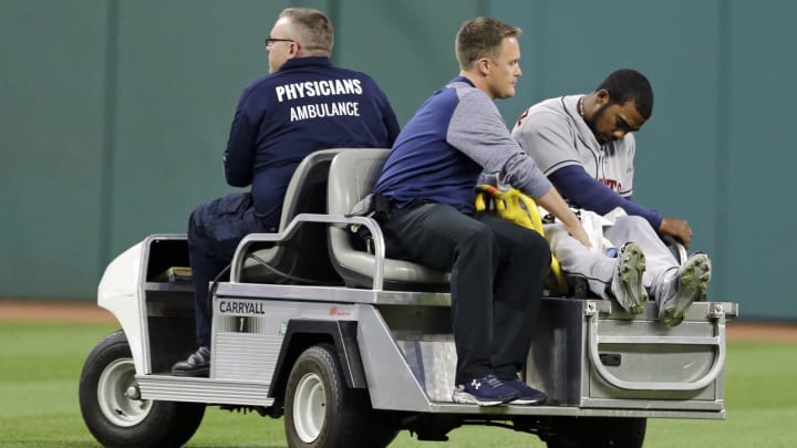 Watch: Teoscar Hernandez carted off the field after scary collision with Jose Altuve