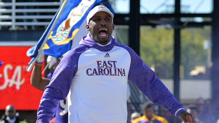 ECU coach visits mother of walk-on, surprises her with news her son is receiving scholarship