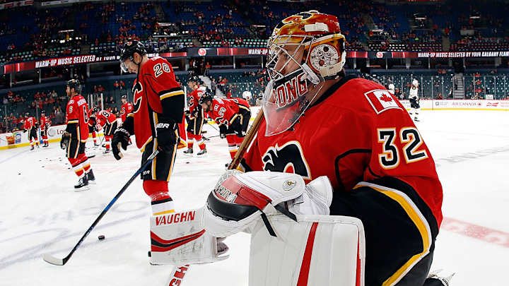 WATCH: Flames’ Jon Gillies Makes Incredible Behind-the-Back Save WATCH: Flames’ Jon Gillies Makes Incredible Behind-the-Back Save
