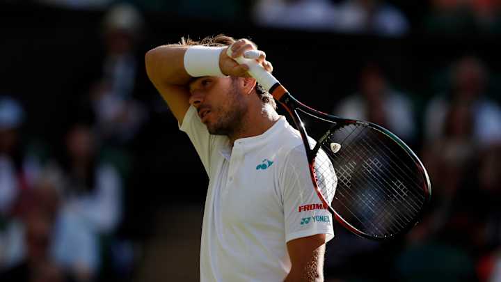 Three-time major champ Wawrinka loses in Wimbledon first round