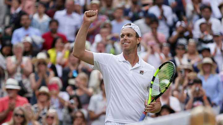 The Latest: Play in men's semifinals starts at Wimbledon