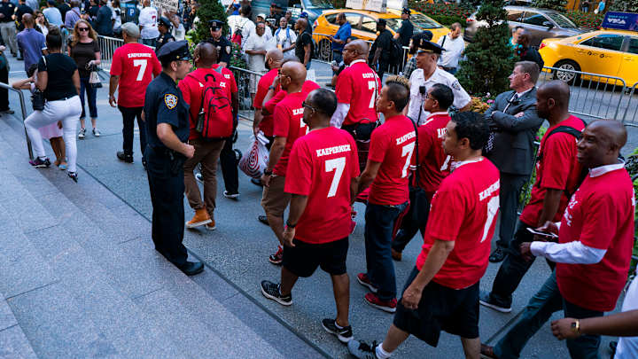 Look: Protestors Gather Outside Of NFL Headquarters For Colin Kaepernick Rally