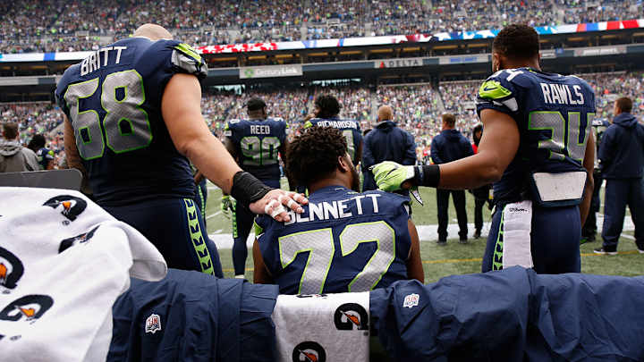 Seahawks' Michael Bennett Sits During National Anthem At Home Opener Seahawks' Michael Bennett Sits During National Anthem At Home Opener