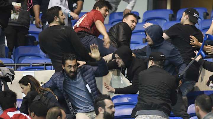 Video: Pregame chaos at Lyon vs. Besiktas forces fans on to field, delays match Video: Pregame chaos at Lyon vs. Besiktas forces fans on to field, delays match
