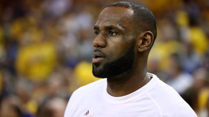 Akron teacher places positive signs outside LeBron James' Ohio home