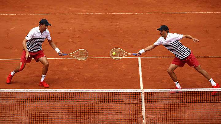 Bryans lose in second round in Paris; top 4 doubles teams out