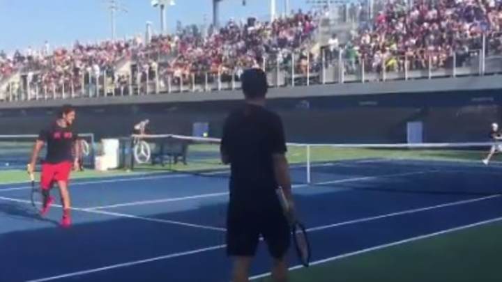 WATCH: Roger Federer warms up with young cancer survivor at U.S. Open WATCH: Roger Federer warms up with young cancer survivor at U.S. Open