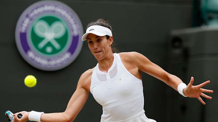 The Latest: Play at Wimbledon in women's semifinals starts