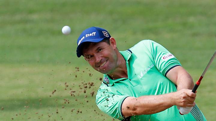 Harrington struck on elbow by amateur's swing, gets stitches