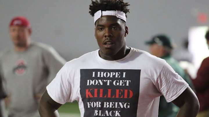 Top college football recruit wears 'I hope I don't get killed for being black today' shirt at camp Top college football recruit wears 'I hope I don't get killed for being black today' shirt at camp