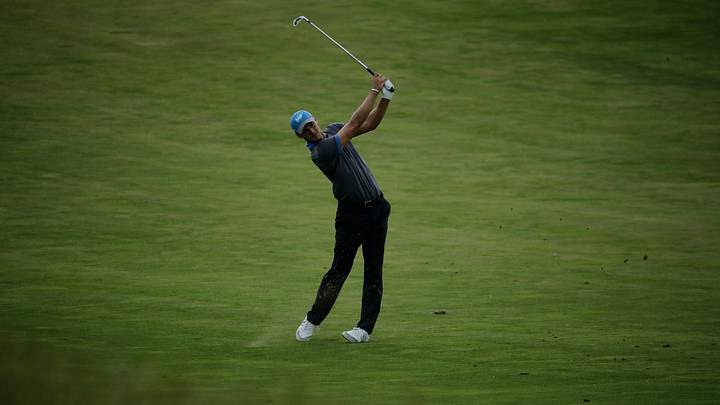 The Latest: Zach Johnson making an early move at Erin Hills