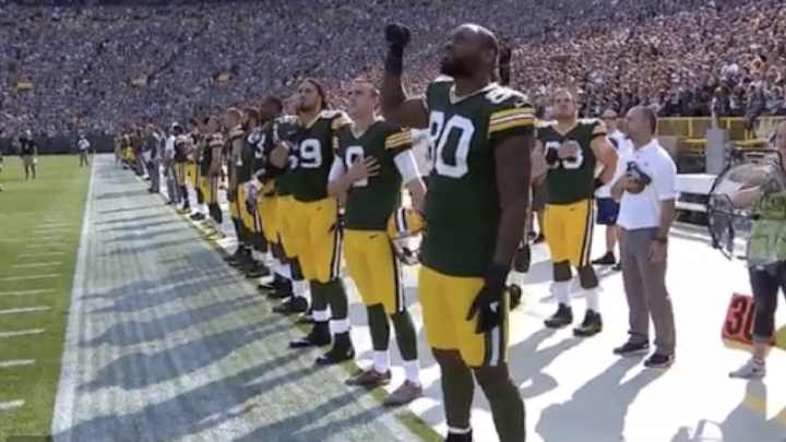 Martellus Bennett Raises Fist During National Anthem, Michael Bennett Protests By Sitting Martellus Bennett Raises Fist During National Anthem, Michael Bennett Protests By Sitting
