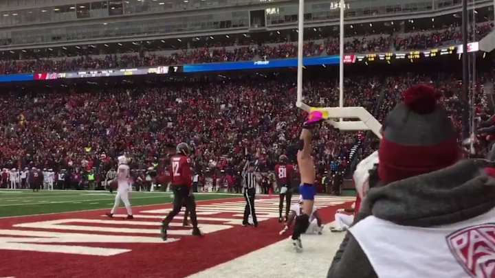 Watch: Washington State Fan Jumps on Field, Pulls Down Pants