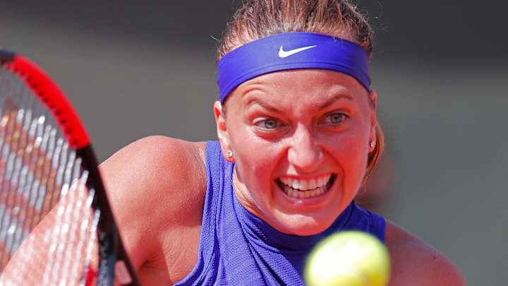 Kvitova wins opening match on grass in Birmingham