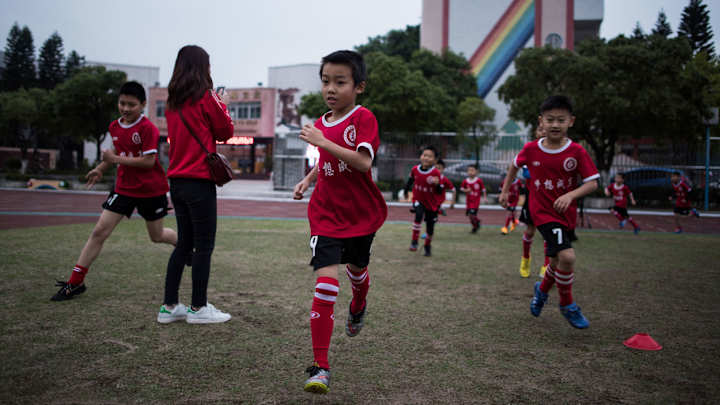 China announces plans to build 50,000 soccer academies by 2025