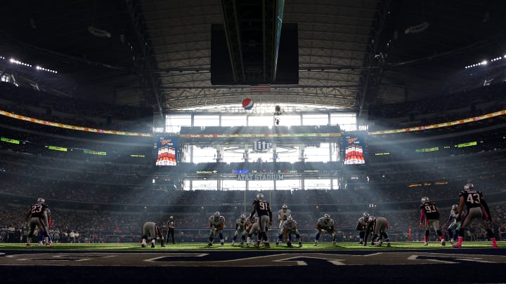 Why were three top-notch reporters laid off from covering America's most popular team?