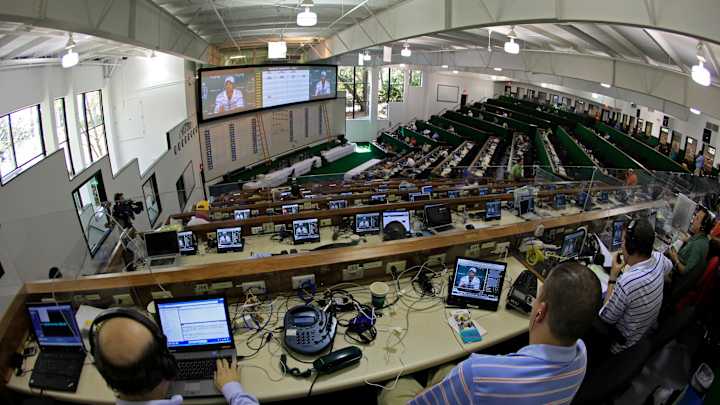 A tale of 2 Masters press centers: From tent to mansion-like
