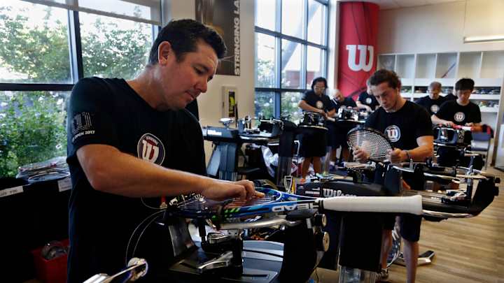 For US Open racket stringers, lots of tension, little thanks
