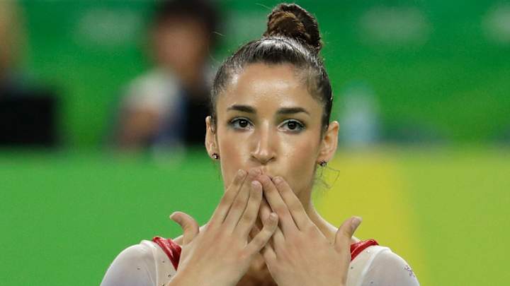 Aly Raisman calls out airport worker for 'muscles' comment