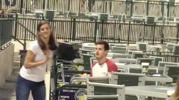 Woman leaves man stranded on one knee in failed ballpark proposal