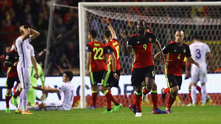 Nine-man Greece holds Belgium to 1-1 in European qualifying Nine-man Greece holds Belgium to 1-1 in European qualifying
