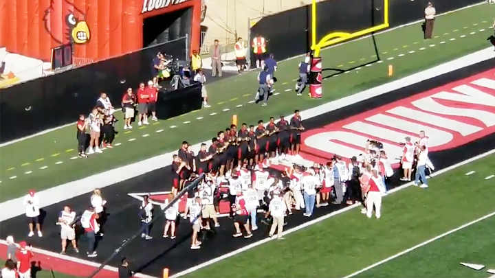 Louisville Basketball Players Get Standing Ovation at Cardinals Football Game