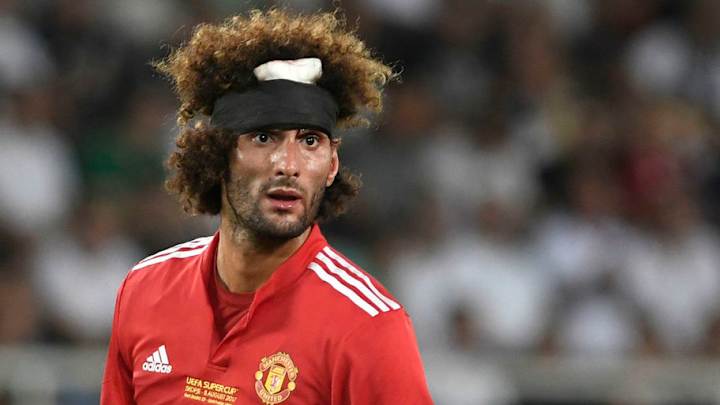 Manchester United's Fellaini Laughs Off Photo of Taking One in the Face During Super Cup Manchester United's Fellaini Laughs Off Photo of Taking One in the Face During Super Cup