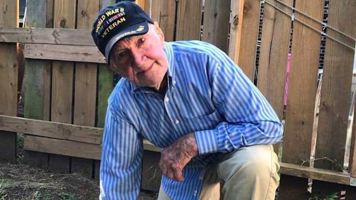 97-Year-Old WWII Veteran Takes a Knee to Show Support of Anthem Protests