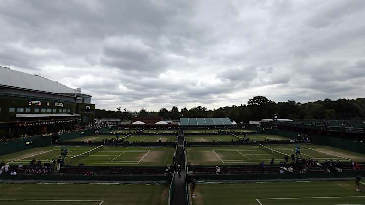 The Latest: Roof to be closed for play on Centre Court