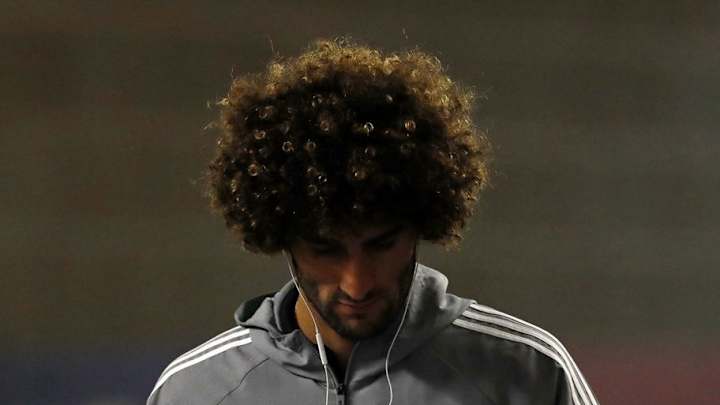 Marouane Fellaini Threatens Legal Action Over Laura Simpson 'Big Mac' Rumours Marouane Fellaini Threatens Legal Action Over Laura Simpson 'Big Mac' Rumours