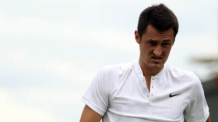 Tomic's Wimbledon words draw $15K fine, racket sponsor loss