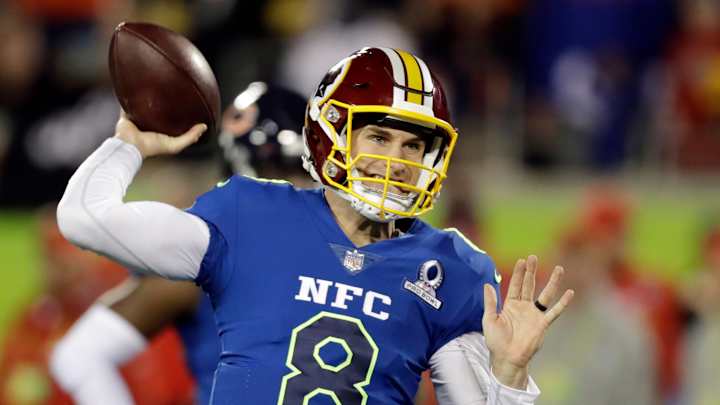 Kirk Cousins chases down Aqib Talib after INT; avoids injury