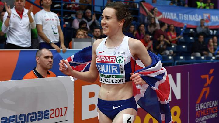 Watch: Official tries to stop gold medalist from a victory lap, runner escapes