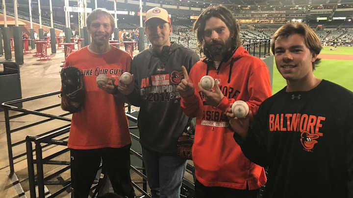 Four friends caught all four homers the Yankees hit against the Orioles