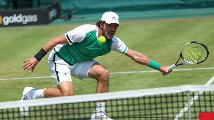 Nishikori opens with hard-fought win at Gerry Weber Open