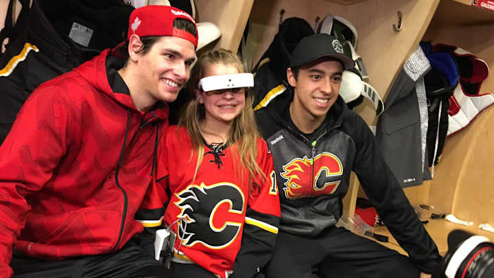 Legally blind Flames fan uses awesome new technology to watch first NHL game